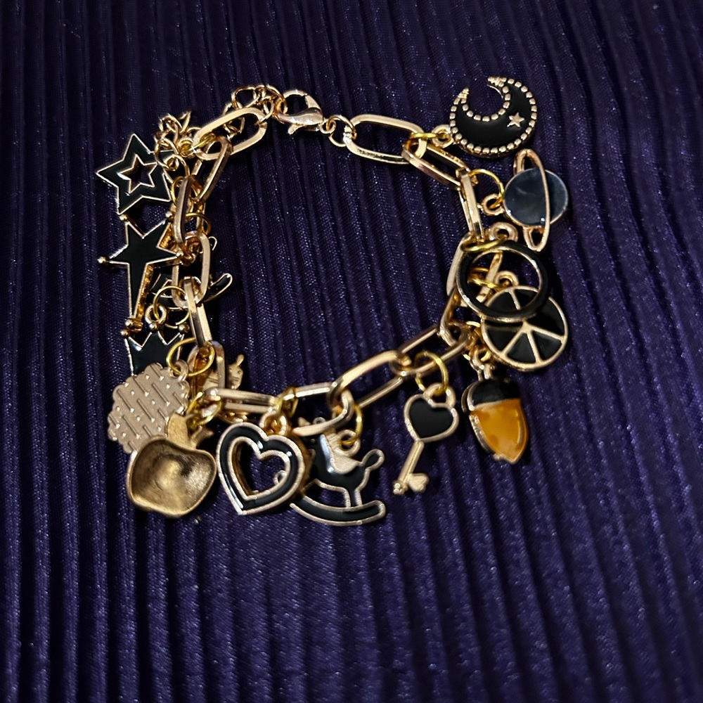 Chic Gold and Black Charm Bracelet